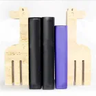 دعامتان للكتب من رخام الترافرتين على شكل زرافة، صنع في إيطاليا - مورا Viadurini