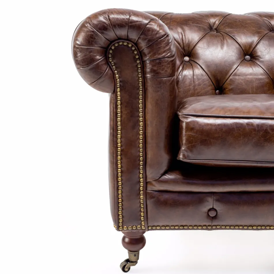 كرسي بذراعين لغرفة المعيشة مصنوع من الجلد العتيق بتأثير عتيق مع عجلات ومساند للذراعين - ختم Viadurini