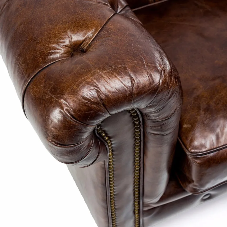 كرسي بذراعين لغرفة المعيشة مصنوع من الجلد العتيق بتأثير عتيق مع عجلات ومساند للذراعين - ختم Viadurini