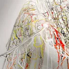 كرسي بذراعين بتصميم عصري من زجاج شبكي متعدد الألوان، صنع في إيطاليا Viadurini