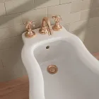 صنبور بيديه بثلاث فتحات بتصميم عتيق من النحاس، صنع في إيطاليا - كلاريسا Viadurini