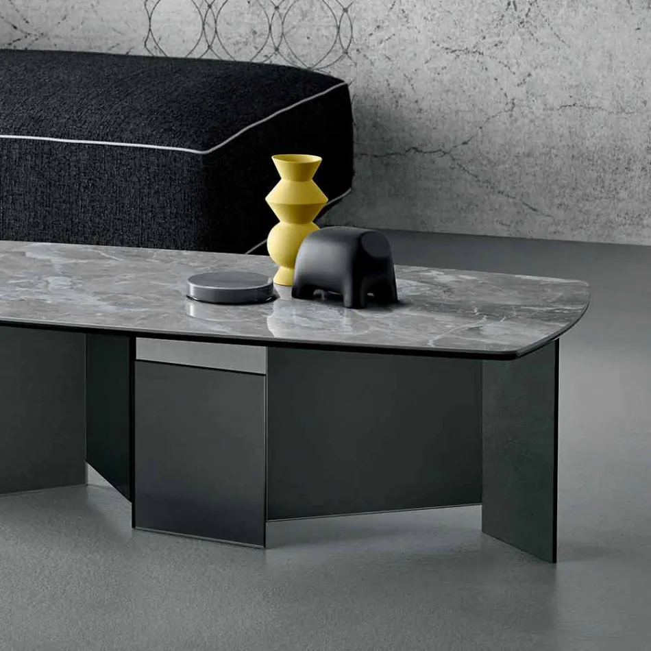 طاولة قهوة منخفضة لغرفة المعيشة، سطح سيراميك وأرجل من الزجاج المدخن، 3 أحجام - عشوائي Viadurini