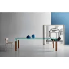 طاولة طعام بسطح زجاجي وقاعدة من الخشب الصلب، صنع في إيطاليا - بريسينو Viadurini