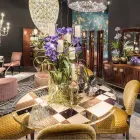 طاولة مودينو المستديرة ذات السطح الزجاجي وتطعيمات خشب أوزي Viadurini